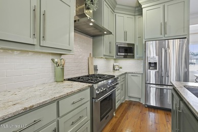 GORGEOUS PROPERTY MADE AVAILABLE DUE TO CORPORATE RELOCATION on Lake Caroline Golf Club in Mississippi - for sale on GolfHomes.com, golf home, golf lot