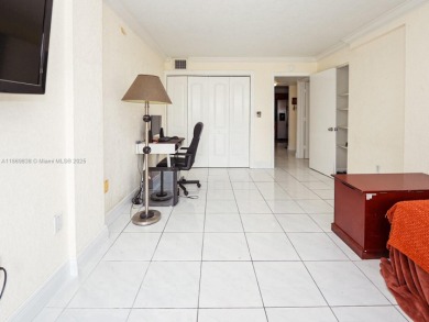 Spacious 2 bedroom, 2 bathroom home filled with natural sunlight on Normandy Shores Golf Course in Florida - for sale on GolfHomes.com, golf home, golf lot