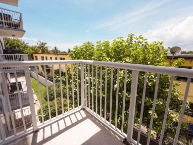 Spacious 2 bedroom, 2 bathroom home filled with natural sunlight on Normandy Shores Golf Course in Florida - for sale on GolfHomes.com, golf home, golf lot