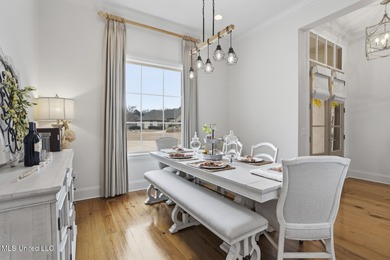 GORGEOUS PROPERTY MADE AVAILABLE DUE TO CORPORATE RELOCATION on Lake Caroline Golf Club in Mississippi - for sale on GolfHomes.com, golf home, golf lot