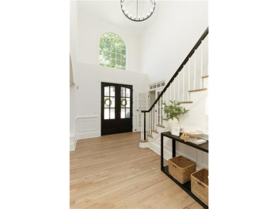 Step into refined elegance and exceptional design in this fully on The Golf Club of Georgia in Georgia - for sale on GolfHomes.com, golf home, golf lot