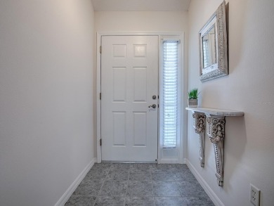 WELL-MAINTAINED  FURNISHED 3/2 WHISPERING PINE DESIGNER HOME on The Links of Spruce Creek in Florida - for sale on GolfHomes.com, golf home, golf lot