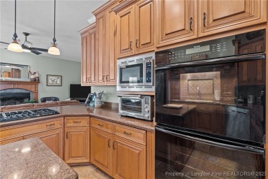 Welcome to refined living at Pinewild Country Club-a private on Pinewild Country Club of Pinehurst in North Carolina - for sale on GolfHomes.com, golf home, golf lot