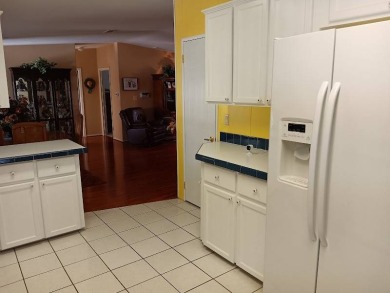 Tremendous 3-bedroom 2-bath located on the 9th fairway at Four on Four Lakes Golf Club in Florida - for sale on GolfHomes.com, golf home, golf lot
