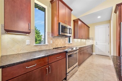 This custom home built 2018 sits on over  3/4  of an acre, in on Plantation Bay Golf and Country Club in Florida - for sale on GolfHomes.com, golf home, golf lot
