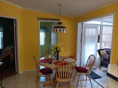 Tremendous 3-bedroom 2-bath located on the 9th fairway at Four on Four Lakes Golf Club in Florida - for sale on GolfHomes.com, golf home, golf lot