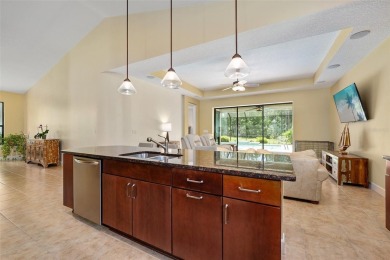 This custom home built 2018 sits on over  3/4  of an acre, in on Plantation Bay Golf and Country Club in Florida - for sale on GolfHomes.com, golf home, golf lot