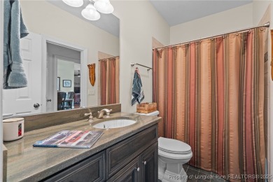 Welcome to refined living at Pinewild Country Club-a private on Pinewild Country Club of Pinehurst in North Carolina - for sale on GolfHomes.com, golf home, golf lot