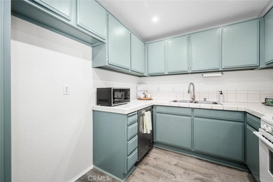 Upper level, one bedroom condo that feels like a tree house with on Diamond Bar Golf Course in California - for sale on GolfHomes.com, golf home, golf lot