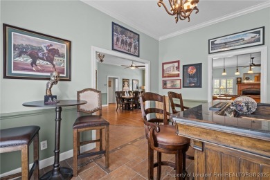 Welcome to refined living at Pinewild Country Club-a private on Pinewild Country Club of Pinehurst in North Carolina - for sale on GolfHomes.com, golf home, golf lot