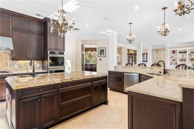 This expansive home is an entertainer's dream, featuring an open on Long Cove Club in South Carolina - for sale on GolfHomes.com, golf home, golf lot