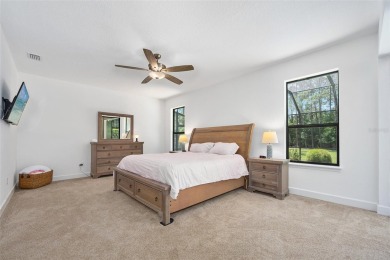 This custom home built 2018 sits on over  3/4  of an acre, in on Plantation Bay Golf and Country Club in Florida - for sale on GolfHomes.com, golf home, golf lot