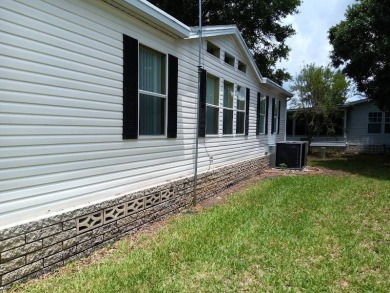 Tremendous 3-bedroom 2-bath located on the 9th fairway at Four on Four Lakes Golf Club in Florida - for sale on GolfHomes.com, golf home, golf lot
