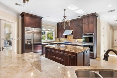 This expansive home is an entertainer's dream, featuring an open on Long Cove Club in South Carolina - for sale on GolfHomes.com, golf home, golf lot