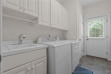 Welcome to refined living at Pinewild Country Club-a private on Pinewild Country Club of Pinehurst in North Carolina - for sale on GolfHomes.com, golf home, golf lot
