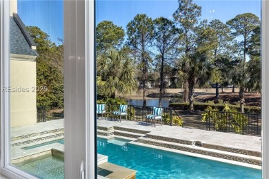 This expansive home is an entertainer's dream, featuring an open on Long Cove Club in South Carolina - for sale on GolfHomes.com, golf home, golf lot