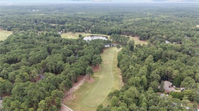 Welcome to refined living at Pinewild Country Club-a private on Pinewild Country Club of Pinehurst in North Carolina - for sale on GolfHomes.com, golf home, golf lot
