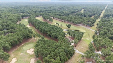 Welcome to refined living at Pinewild Country Club-a private on Pinewild Country Club of Pinehurst in North Carolina - for sale on GolfHomes.com, golf home, golf lot