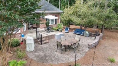 Welcome to refined living at Pinewild Country Club-a private on Pinewild Country Club of Pinehurst in North Carolina - for sale on GolfHomes.com, golf home, golf lot