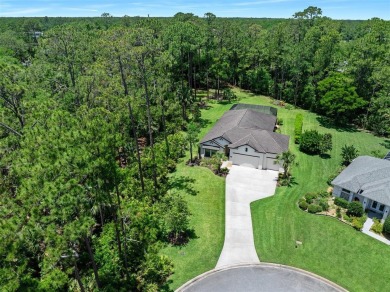 This custom home built 2018 sits on over  3/4  of an acre, in on Plantation Bay Golf and Country Club in Florida - for sale on GolfHomes.com, golf home, golf lot