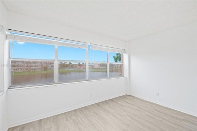 Welcome to this bright and spacious 1-bedroom, 1.5-bathroom on Sunrise Lakes Phase III in Florida - for sale on GolfHomes.com, golf home, golf lot
