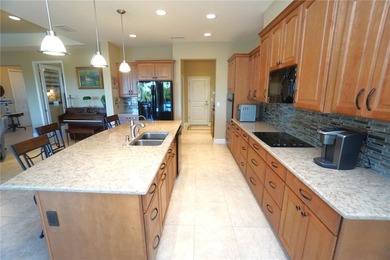 Welcome to this beautiful 2014, 4 bedroom, 3 bath home that has on Twin Isles Country Club in Florida - for sale on GolfHomes.com, golf home, golf lot
