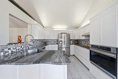 Stunning Split level home with 4 Bedrooms, 2.5 baths.  Lots of on Indian Springs Country Club in Oklahoma - for sale on GolfHomes.com, golf home, golf lot