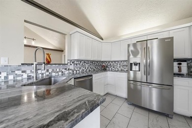 Stunning Split level home with 4 Bedrooms, 2.5 baths.  Lots of on Indian Springs Country Club in Oklahoma - for sale on GolfHomes.com, golf home, golf lot