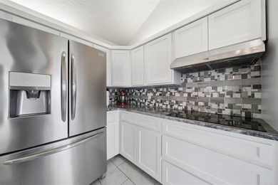 Stunning Split level home with 4 Bedrooms, 2.5 baths.  Lots of on Indian Springs Country Club in Oklahoma - for sale on GolfHomes.com, golf home, golf lot