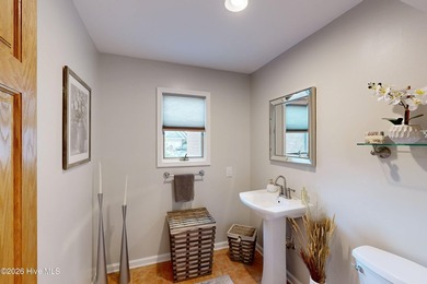 Wake up to golf course and ICW views at 413 Sawgrass Cove in on North Shore Country Club in North Carolina - for sale on GolfHomes.com, golf home, golf lot