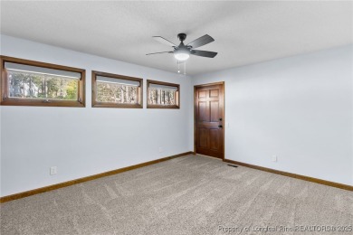 The perfect home for those that love to relax. This single-story on Carolina Trace Country Club in North Carolina - for sale on GolfHomes.com, golf home, golf lot