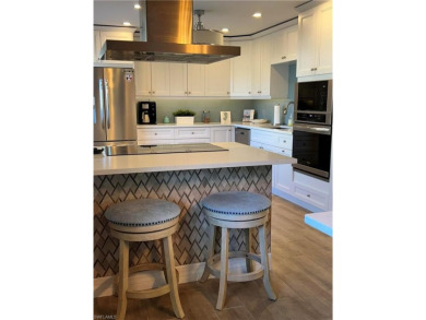 This completely renovated unit offers an open layout with a on The Glades Golf and Country Club in Florida - for sale on GolfHomes.com, golf home, golf lot