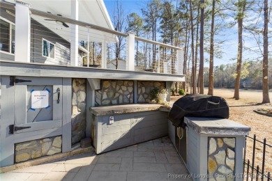 The perfect home for those that love to relax. This single-story on Carolina Trace Country Club in North Carolina - for sale on GolfHomes.com, golf home, golf lot