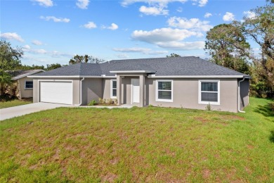 NEW CONSTRUCTION! MOVE-IN-READY! GREAT INVESTMENT OPPORTUNITY OR on Port Charlotte Golf Club in Florida - for sale on GolfHomes.com, golf home, golf lot