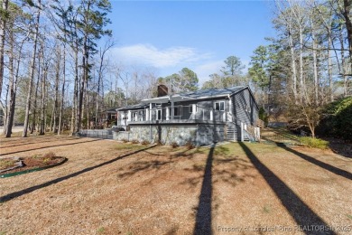 The perfect home for those that love to relax. This single-story on Carolina Trace Country Club in North Carolina - for sale on GolfHomes.com, golf home, golf lot