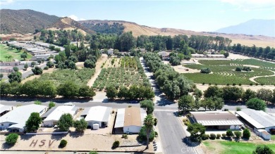 Corner lot residence, situated in a prime location in Highland on Oak Valley Golf Club in California - for sale on GolfHomes.com, golf home, golf lot