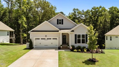Elegant Ranch Home at Lake Royale's River Golf Club Course on River Golf and County Club at Lake Royale in North Carolina - for sale on GolfHomes.com, golf home, golf lot
