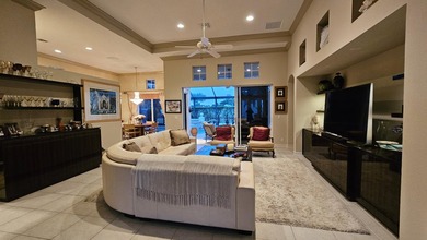 Just listed! This 3BR/3BA Plus Den home borders the 7th hole of on  in Florida - for sale on GolfHomes.com, golf home, golf lot