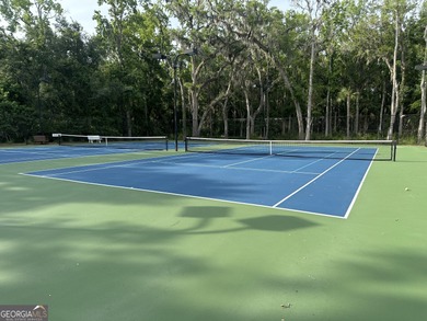 Beautiful wooded lot nestled within the exclusive on The Golf Club At Sanctuary Cove in Georgia - for sale on GolfHomes.com, golf home, golf lot