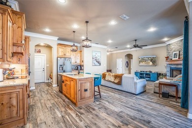 Situated high at the end of a quiet cul-de-sac, this brick and on Pecan Plantation Country Club in Texas - for sale on GolfHomes.com, golf home, golf lot