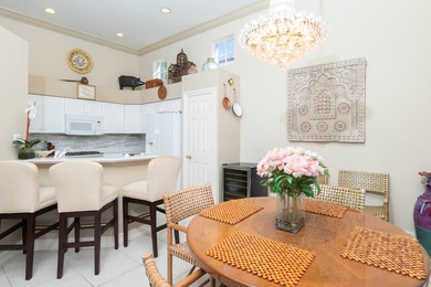 Just listed! This 3BR/3BA Plus Den home borders the 7th hole of on  in Florida - for sale on GolfHomes.com, golf home, golf lot