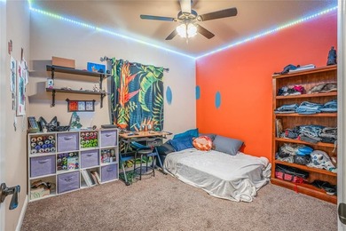 Situated high at the end of a quiet cul-de-sac, this brick and on Pecan Plantation Country Club in Texas - for sale on GolfHomes.com, golf home, golf lot