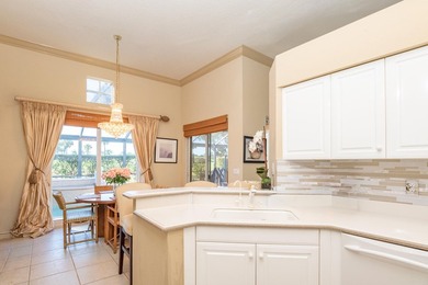 Just listed! This 3BR/3BA Plus Den home borders the 7th hole of on  in Florida - for sale on GolfHomes.com, golf home, golf lot