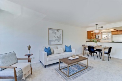 Experience elevated living in this stunning second-floor condo on El Dorado Park Golf Course in California - for sale on GolfHomes.com, golf home, golf lot