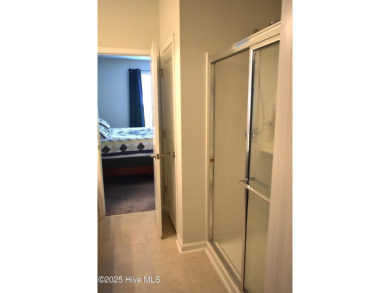 This beautifully designed unit is a true gem, AND A HUGE $$$ on Carolina Shores Golf Course in North Carolina - for sale on GolfHomes.com, golf home, golf lot