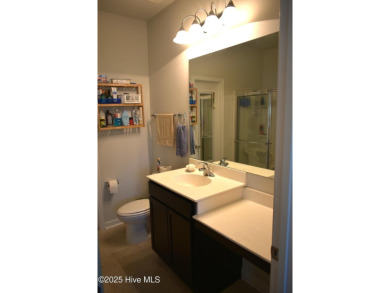 This beautifully designed unit is a true gem, AND A HUGE $$$ on Carolina Shores Golf Course in North Carolina - for sale on GolfHomes.com, golf home, golf lot