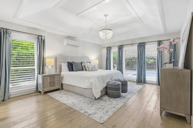 Welcome to this beautifully updated and modern 4-bedroom, 2 on Hamlet Country Club in Florida - for sale on GolfHomes.com, golf home, golf lot