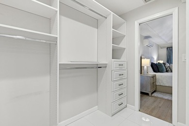 Welcome to this beautifully updated and modern 4-bedroom, 2 on Hamlet Country Club in Florida - for sale on GolfHomes.com, golf home, golf lot