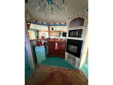 An artist retreat on the beachside!  This two bedroom, two bath on Grand Haven Golf Club in Florida - for sale on GolfHomes.com, golf home, golf lot