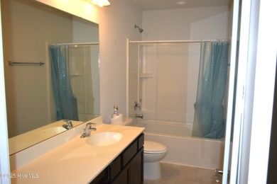 This beautifully designed unit is a true gem, AND A HUGE $$$ on Carolina Shores Golf Course in North Carolina - for sale on GolfHomes.com, golf home, golf lot